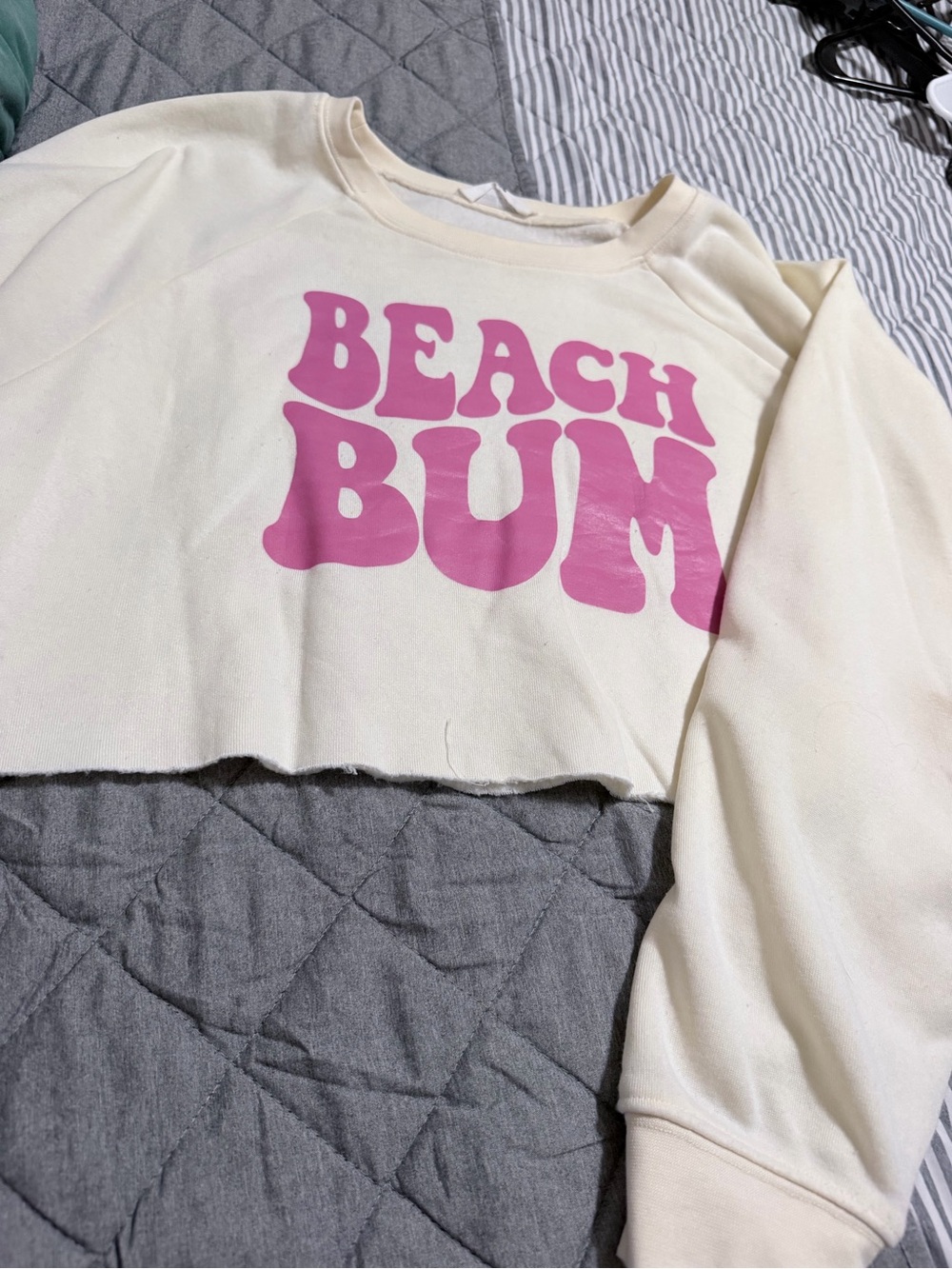 Double Zero Cream Cropped Sweatshirt with Pink "BEACH BUM" Graphic